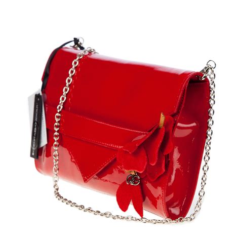 red patent evening bag.